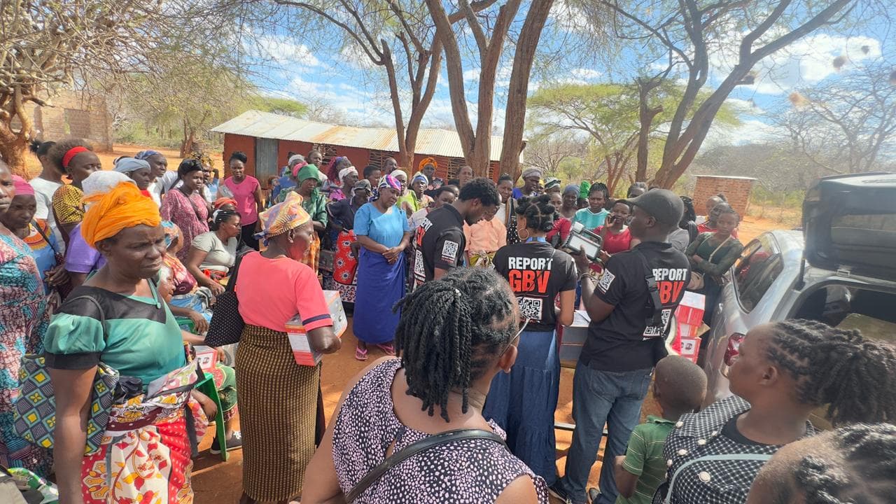 Sauti Salama team engaging community members during a renewable energy demonstration